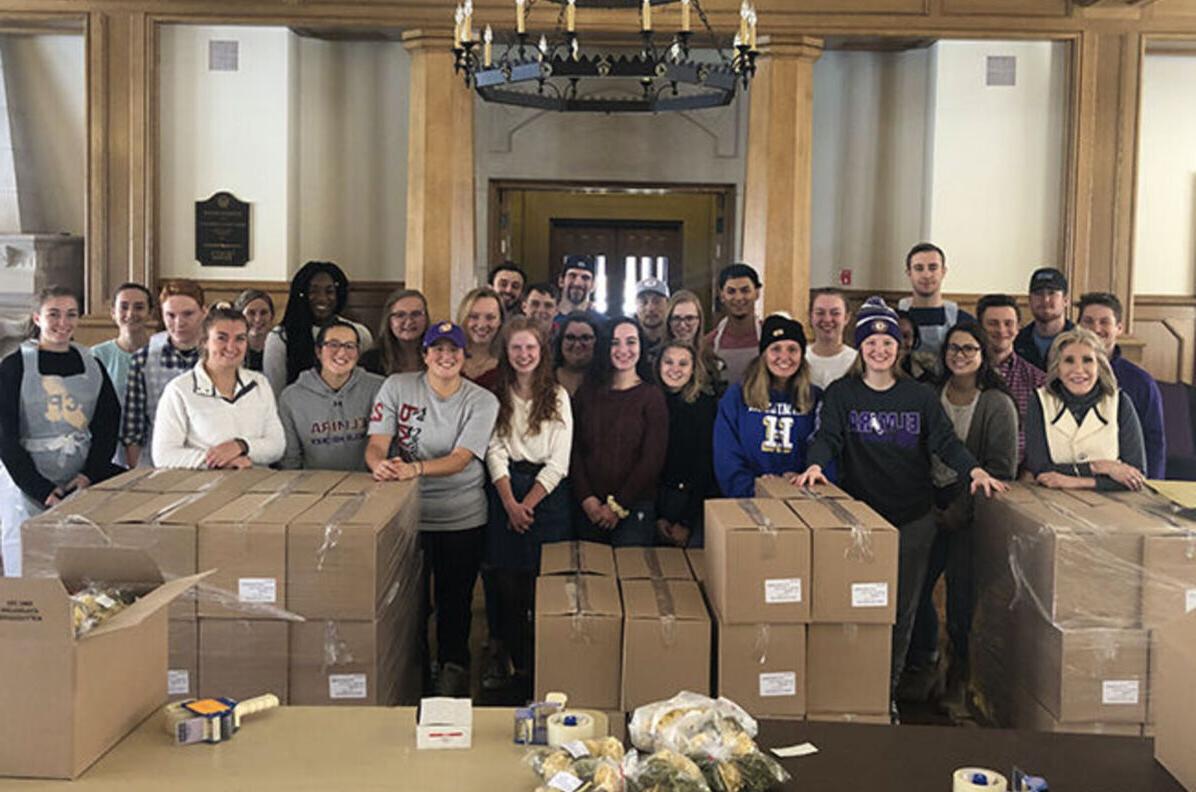 EC2 members pack items for a mobile food pantry